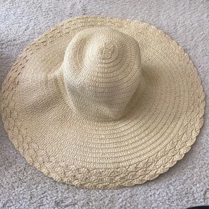 Sun hat! Add a scarf to make fancy or casual.